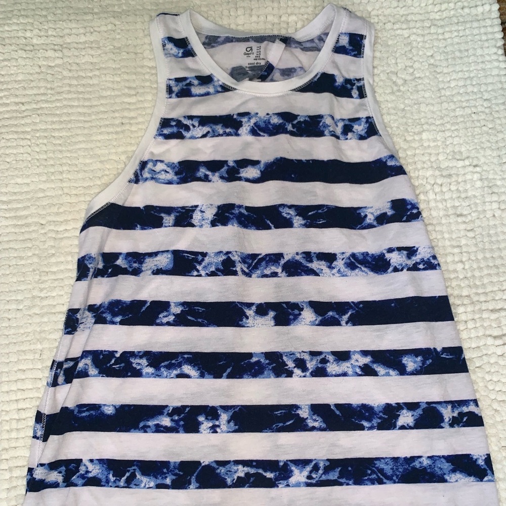 Blue and white striped open back tank top.